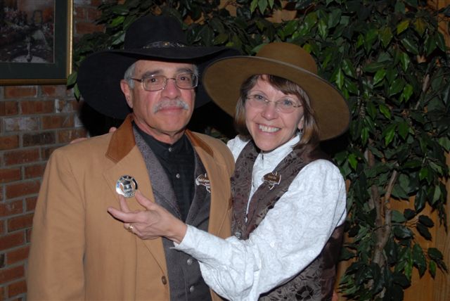 Black Canyon Pete and Tucson Tess showing off his new SASS Regulator badge.